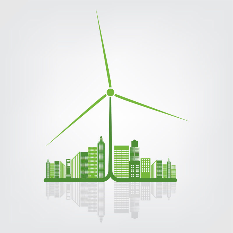 Grafika przedstawia turbinę wiatrową dominującą nad wieżowcami.
