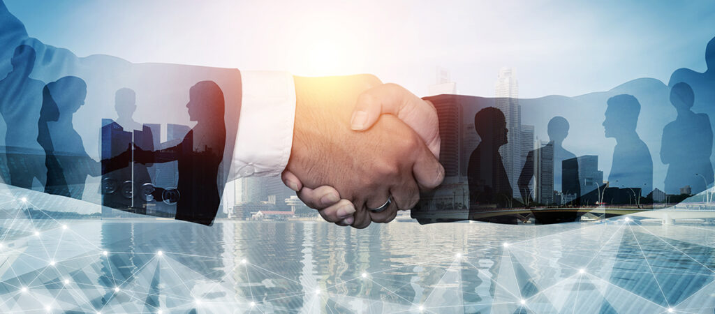 Grafika, na którą składają się obrazy ściskających się dłoni oraz osób rozmawiających na tle wieżowców.